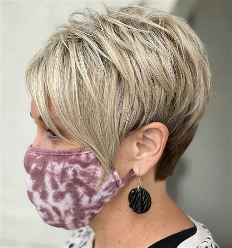 Short hairstyles 2023 female over 50 - Blunt Bob. Getty Images. A well-styled bob is another beautiful style for women over 50. “I love a classic bob because it works on mostly all face shapes and works well with straight, wavy, and ...